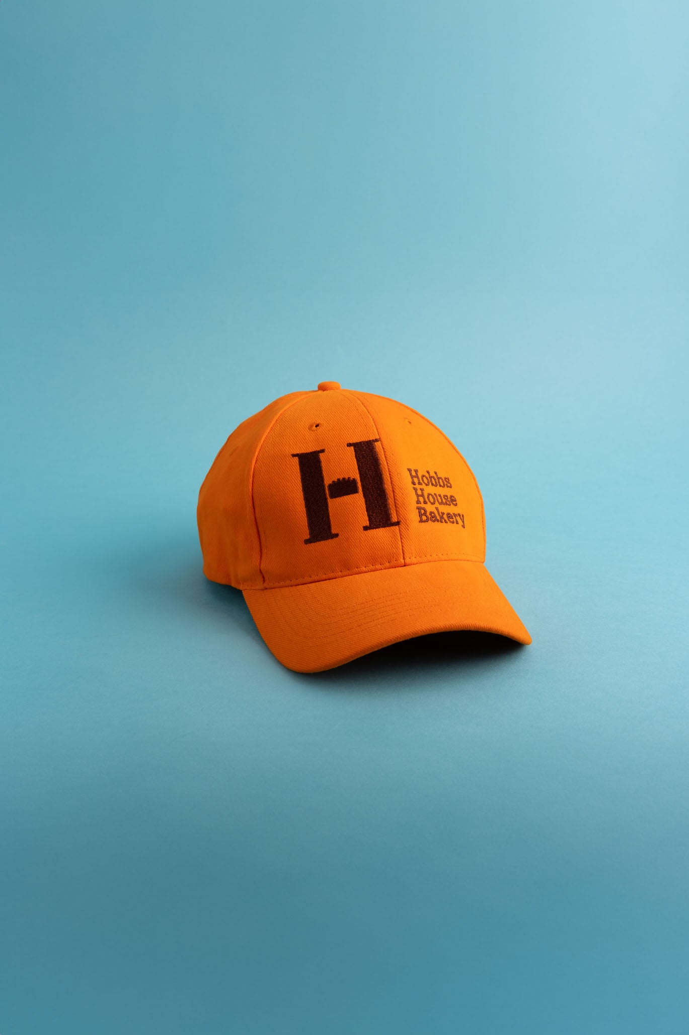 Orange Cap with Brown HHB Logo